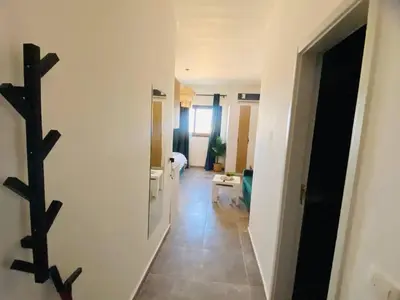 a hallway leading to a living room with at Aqua Infinity in Hurghada