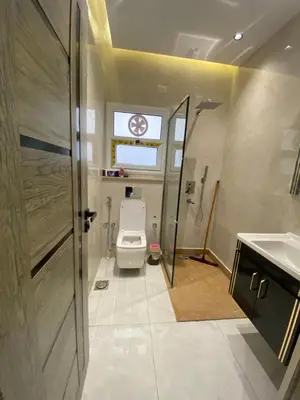 a bathroom with a toilet and a sink at Private 3 bedroom apartment in Hurghada