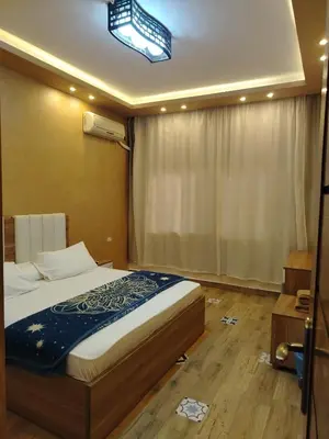 a bedroom with a bed in a room at Hurghada - star beach water front chalets - 3BR in Hurghada