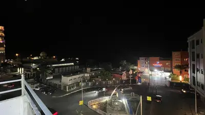 a view of a city at night at شقة فندقية امام المارينا 3 غرف 5 سراير in Hurghada