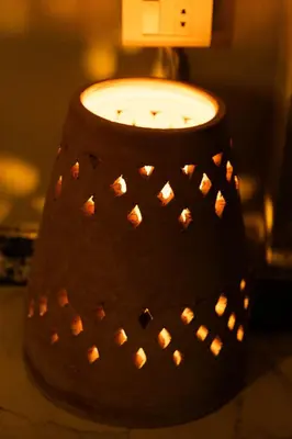 a candle sitting on top of a table at Spacious and Chic 3 Bedroom Appartment Beautiful Rooftop Terrace Great location to explore Hurghada in Hurghada