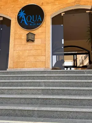 a set of stairs in front of a building at 201 Aqua Blue Bay in Hurghada