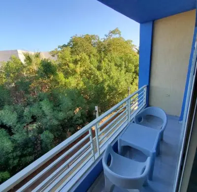a balcony with a toilet on the side of a building at Hurghada Aqua-Mirage Beach Resort in Hurghada