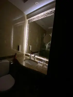 a bathroom with a sink and a mirror at Cecelia Resort Hurghada H11 in Hurghada