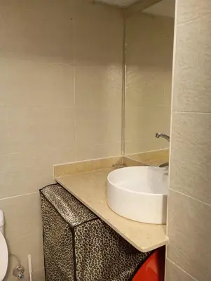 a bathroom with a white sink on a counter at Florenza khamsin Resort Hurghada P109 in Hurghada