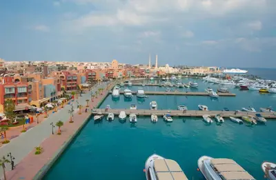 a marina with boats in the water in a city at Luxury Stay in Marina Soma Bay in Hurghada
