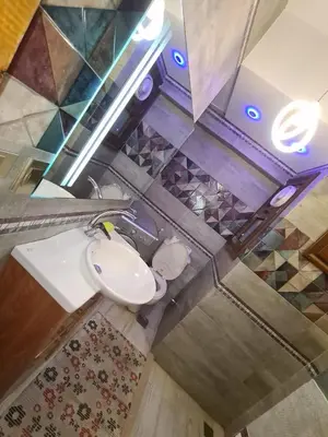 an overhead view of a bathroom with a toilet at ElGouna west golf 2 bedrooms 2 bathrooms - pool in Hurghada
