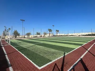 a soccer field with a net and a goal at 2BR Makadi heights -cozy Flat in Hurghada