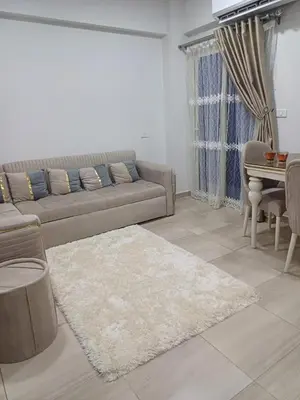 a living room with a couch and a table at Appartement for rent in Hurghada in Hurghada