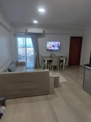 a living room with a couch and a table at Appartement for rent in Hurghada in Hurghada