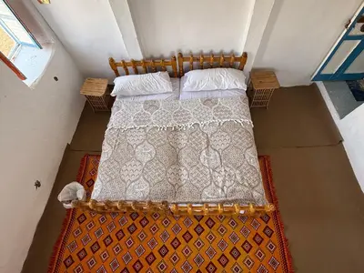 an overhead view of a bed in a room at Per Ankh - Heissa island - Aswan in Aswan