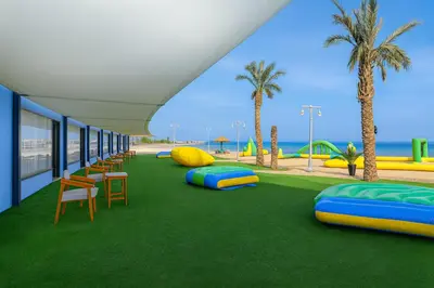 a playground with colorful inflatables on the beach at Aquatic Village - Red Sea Resort in Hurghada