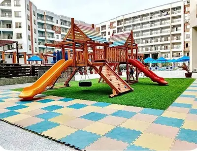 a playground with a slide and a slideintend at Pearl of Tiba Golden Resort in Hurghada