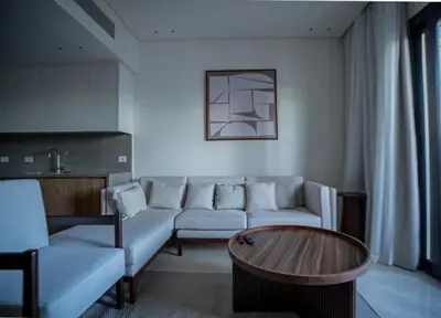 a living room with a couch and a table at Ancient Sands El Gouna Hurghada in Hurghada