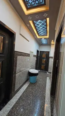 a bathroom with a toilet in the middle of a building at Saint charbel in Hurghada