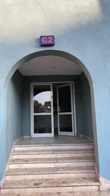an entrance to a building with a door and stairs at New Marina Apartments in Hurghada