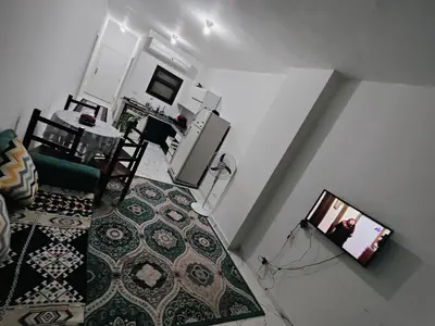 an aerial view of a living room with a kitchen at Turtles Beach Chalet in Hurghada