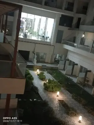 an aerial view of a building with lights in a courtyard at luxury one bedroom at scandic resort in Hurghada