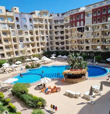 an overhead view of a swimming pool in a resort at Benashti Hurghada apartment in Hurghada