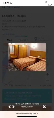 a screenshot of a hotel room with a bed at New mostafa hotel in Luxor