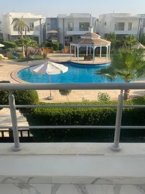 a swimming pool with a gazebo and a gazebo at Sky Star Villa 30 in Hurghada