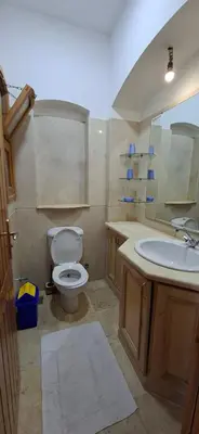 a bathroom with a toilet and a sink at El Gouna Upper nubia in Hurghada