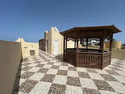 a gazebo on the roof of a building at Pause by The Sea Hurghada, Stay, Relax, Repeat in Hurghada
