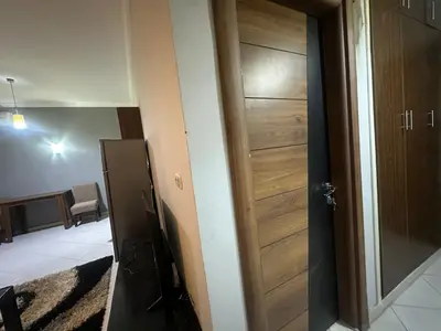 a door leading into a room with a hallway at Desert Pearl Lux in Hurghada