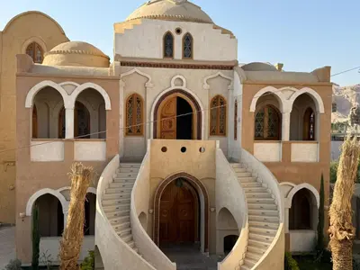 an old building with a staircase in front of it at Saray ElOmda Wellness - Retreat Village in Al Karnak