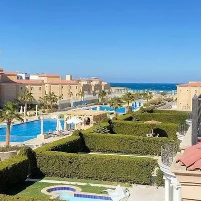 a view of a resort with a pool and bushes at Selena bay hurghada in Hurghada
