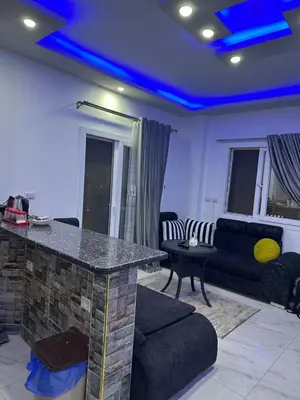 a living room with a blue ceiling at Red Sea view in Hurghada