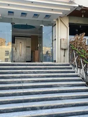 a set of stairs in front of a building at Paradise at Tiba Al Ahyaa, Hurghada in Hurghada