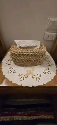 a basket sitting on top of a table with a rug at MaMa Africa Nubian Guest House in Aswan