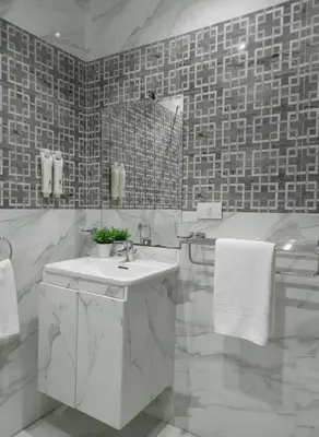 a white bathroom with a sink and a tub at Hurghada luxury apartment sea view in Hurghada