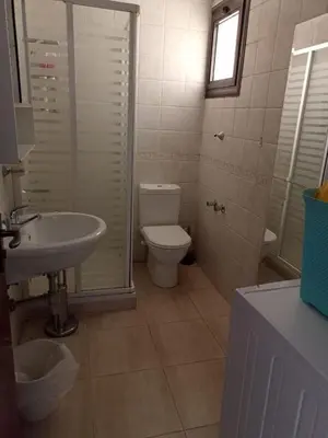 a bathroom with a toilet and a sink at Sea View luxury chalet in Hurghada