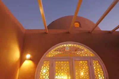 a building with a stained glass window on it at Mountian View Domes in Al Aqālitah