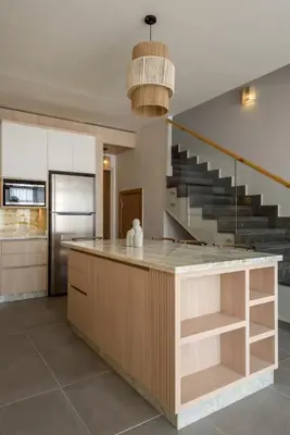 a kitchen with a counter and a staircase at The Best House in Makadi in Hurghada