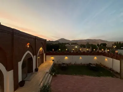 an aerial view of a building with a patio at Temple Of The Golden Sun in Luxor