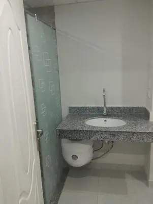 a bathroom with a sink and a toilet at scandic Beach Hurghada in Hurghada