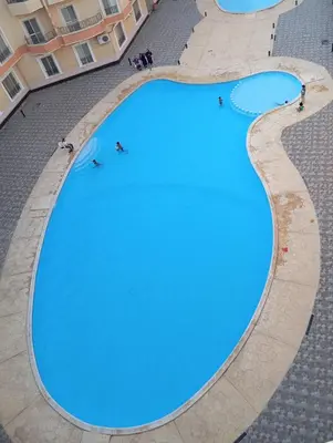 an overhead view of a large swimming pool at Red Ruby chalets &flats HRG,Elgouna in Hurghada