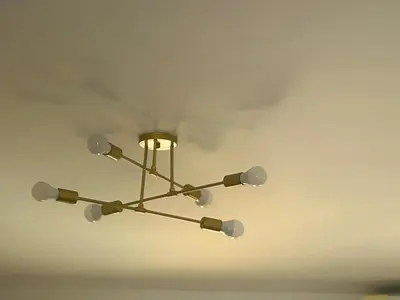 a chandelier hanging from the ceiling of a room at Aqua infinity resort in Hurghada