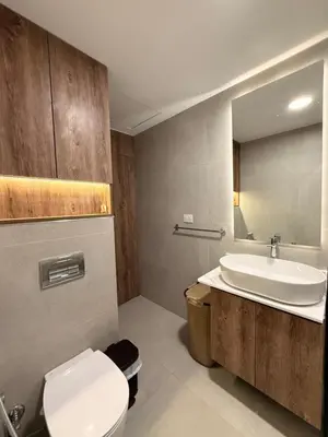 a bathroom with a toilet and a sink at Luxury Sea View Apartment Near Hurghada Airport in Hurghada