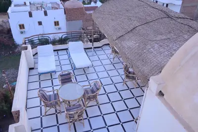 an overhead view of a patio with a table and chairs at Qasr El Nil in Luxor