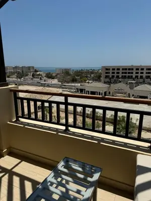 a balcony with a view of a city at Lotus Al-Dau Heights in Hurghada