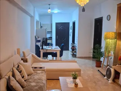 a living room with a couch and a table at Apartman v Hurgade 2 izbovy , v rezorte Florenza,plne zariadeny in Hurghada