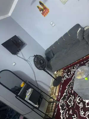 an overhead view of a living room with a table and a room at أسوان in Aswan