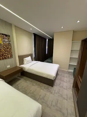 a hotel room with two beds at CBA - Cavalli Boutique Apartments in Hurghada