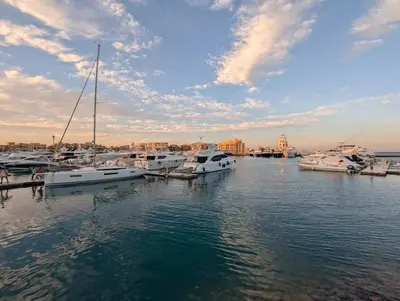 a group of boats docked in a harbor at EL GOUNA Boho Beach Chalet with pool access in Hurghada