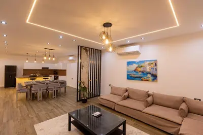 a living room with a couch and a table at private villa in Hurghada