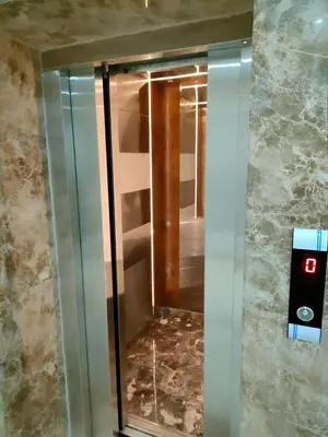an elevator in a hotel room with a mirror at Scandic Resort Hurghada App-C310 in Hurghada